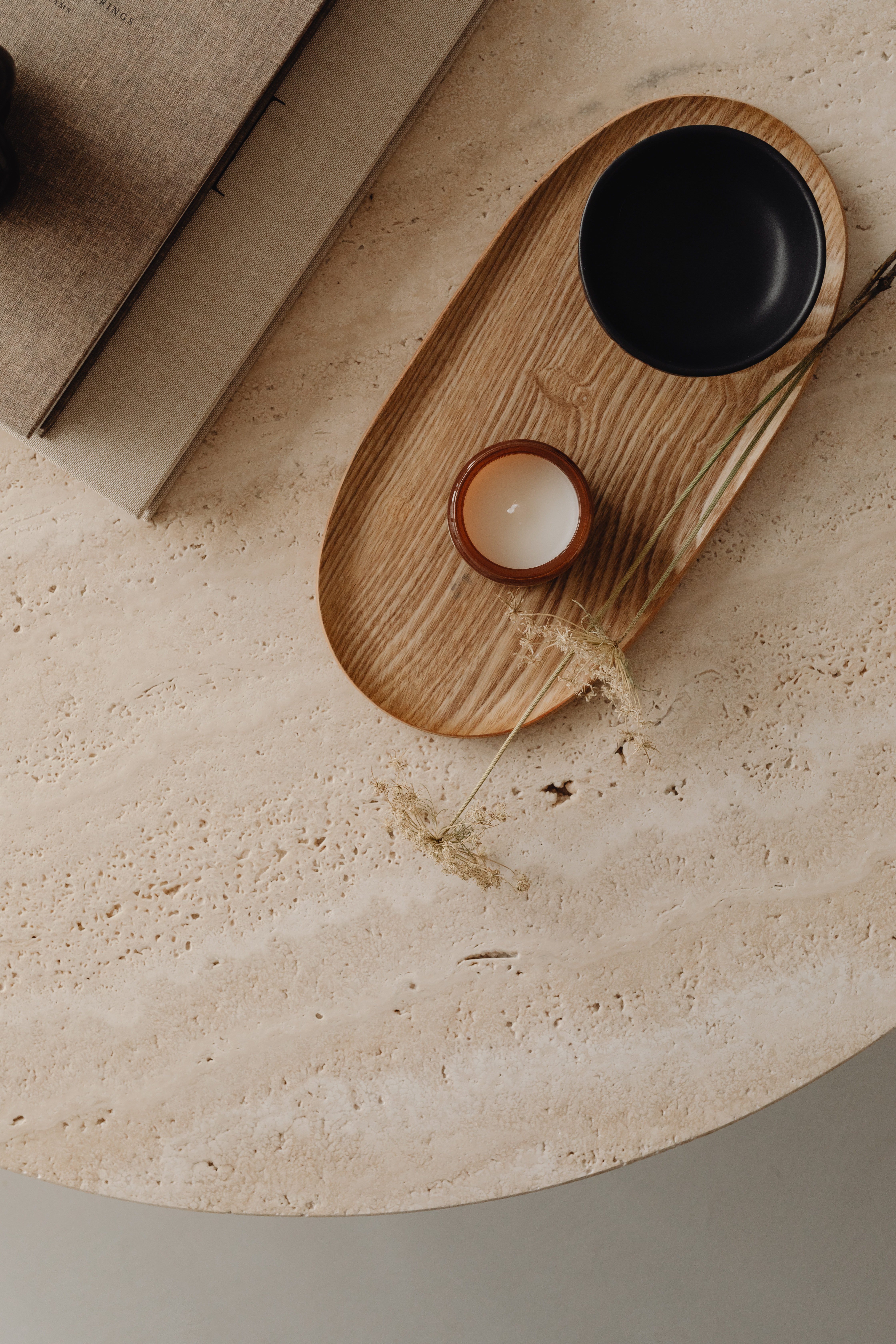 Wooden tray and candle for a cosy feel